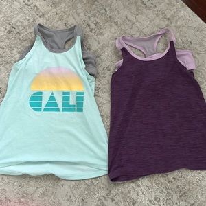 Two old navy active tanks with built in sports bra.  Girls large (10/12)
